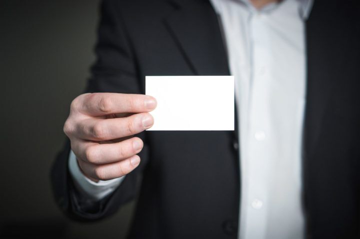 person-holding-white-paper-326569